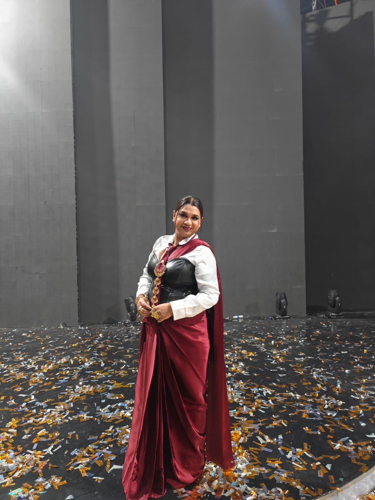 Neelam Roy on grand finale stage with golden confetti celebration